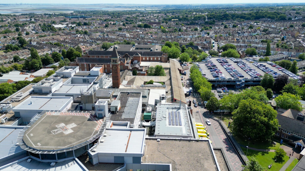 Aerial view of Medway Maritime Hospital including solar panels on the Emergency Department roof
